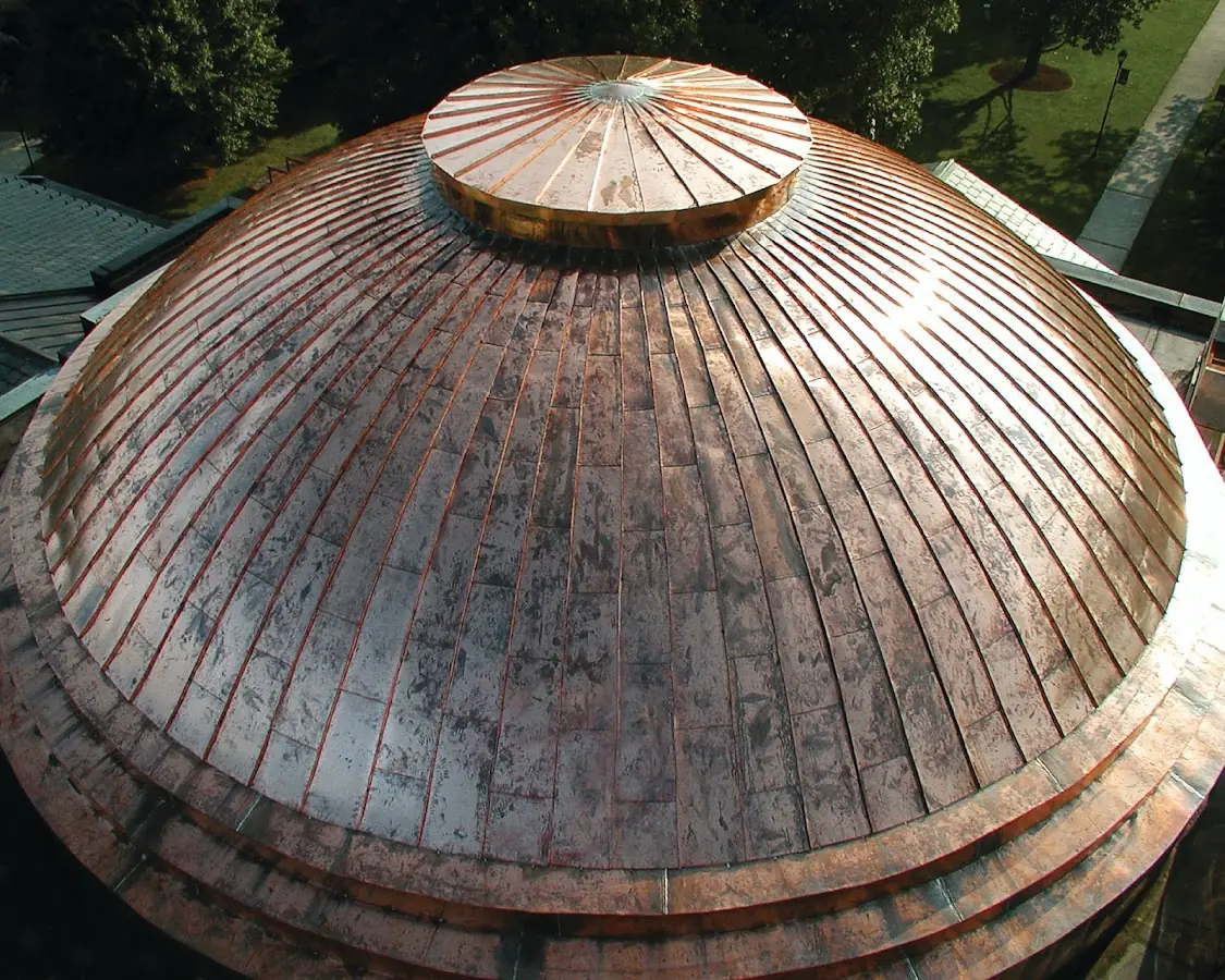 Craftsman Roofing crew installing a new roof in Carthage